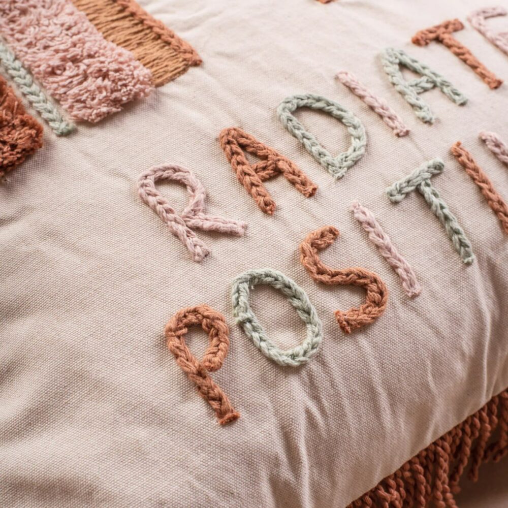 Ian Snow Radiate Positivity Cushion - close up