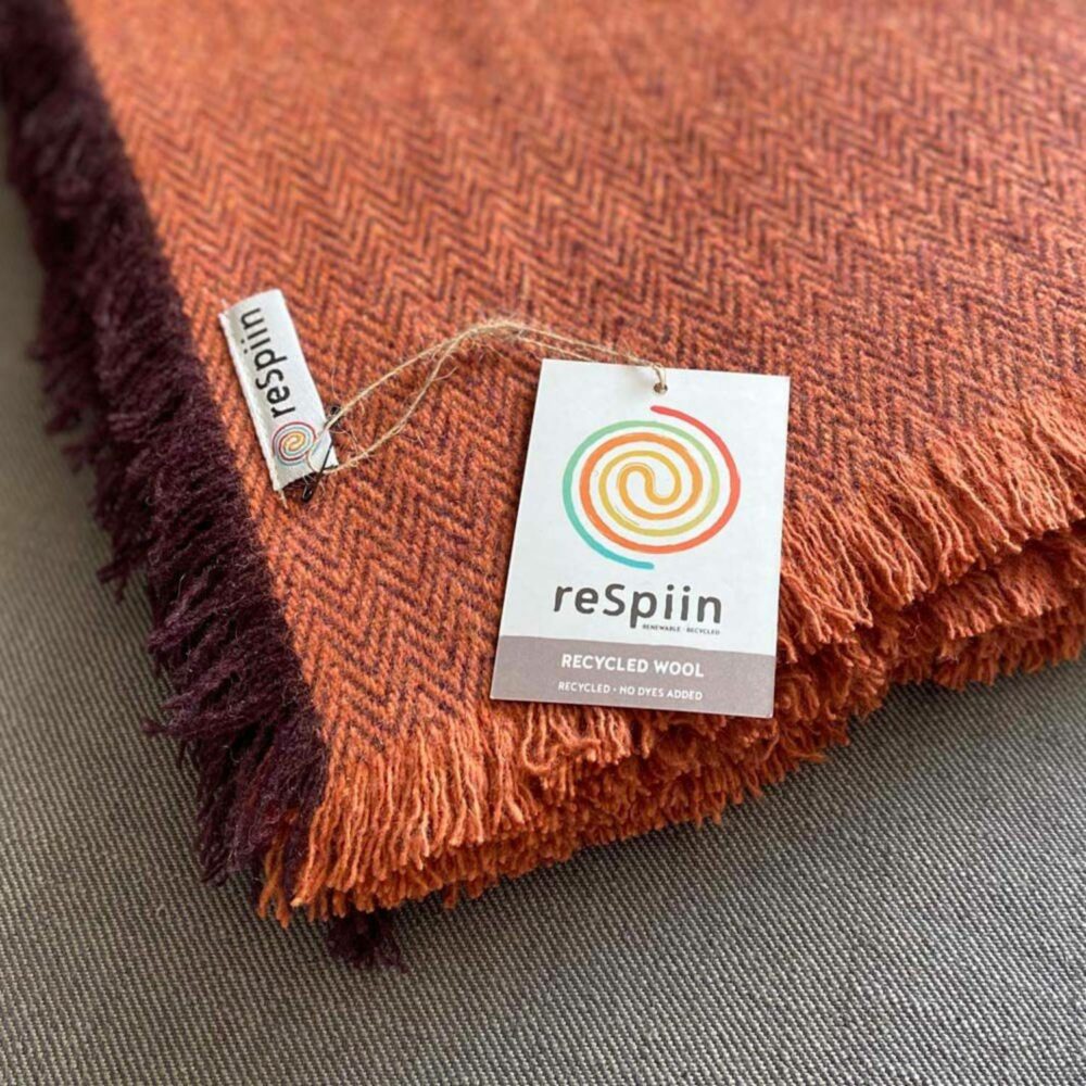 respiin blanket rust close up with label