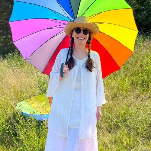Katherine Greenwell under a umbrella