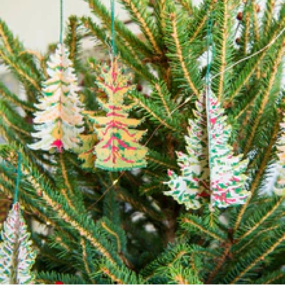 Forest decorations shown hanging on a Christmas Tree