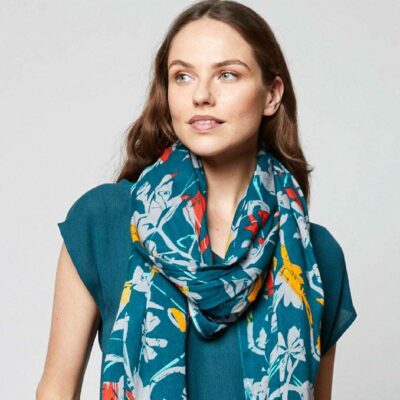 woman wearing java print scarf styled around her neck