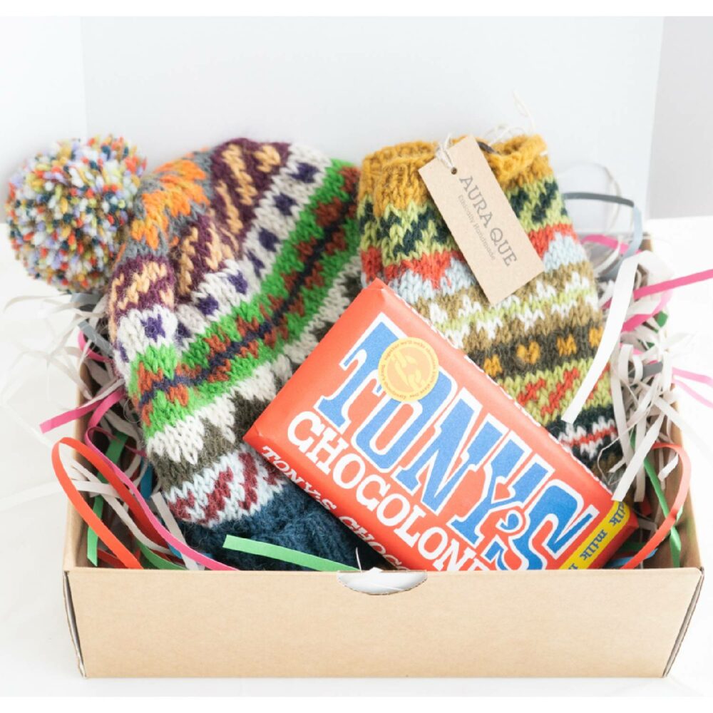 open box with bobble hat, fingerless mitts and bar of Tony's chocolate