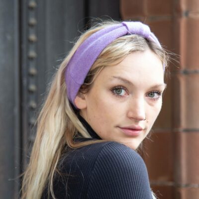 Woman wearing turtle doves recycled cashmere headband